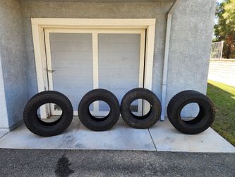 4 Goodyear Wrangler Territory LT325/65R18 Tires - $100