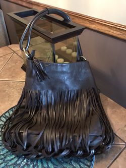 Brown leather fringe purse