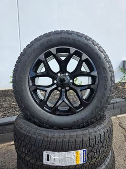 20" Gloss black rims w/ Goodyear A/T tires 275-60R20