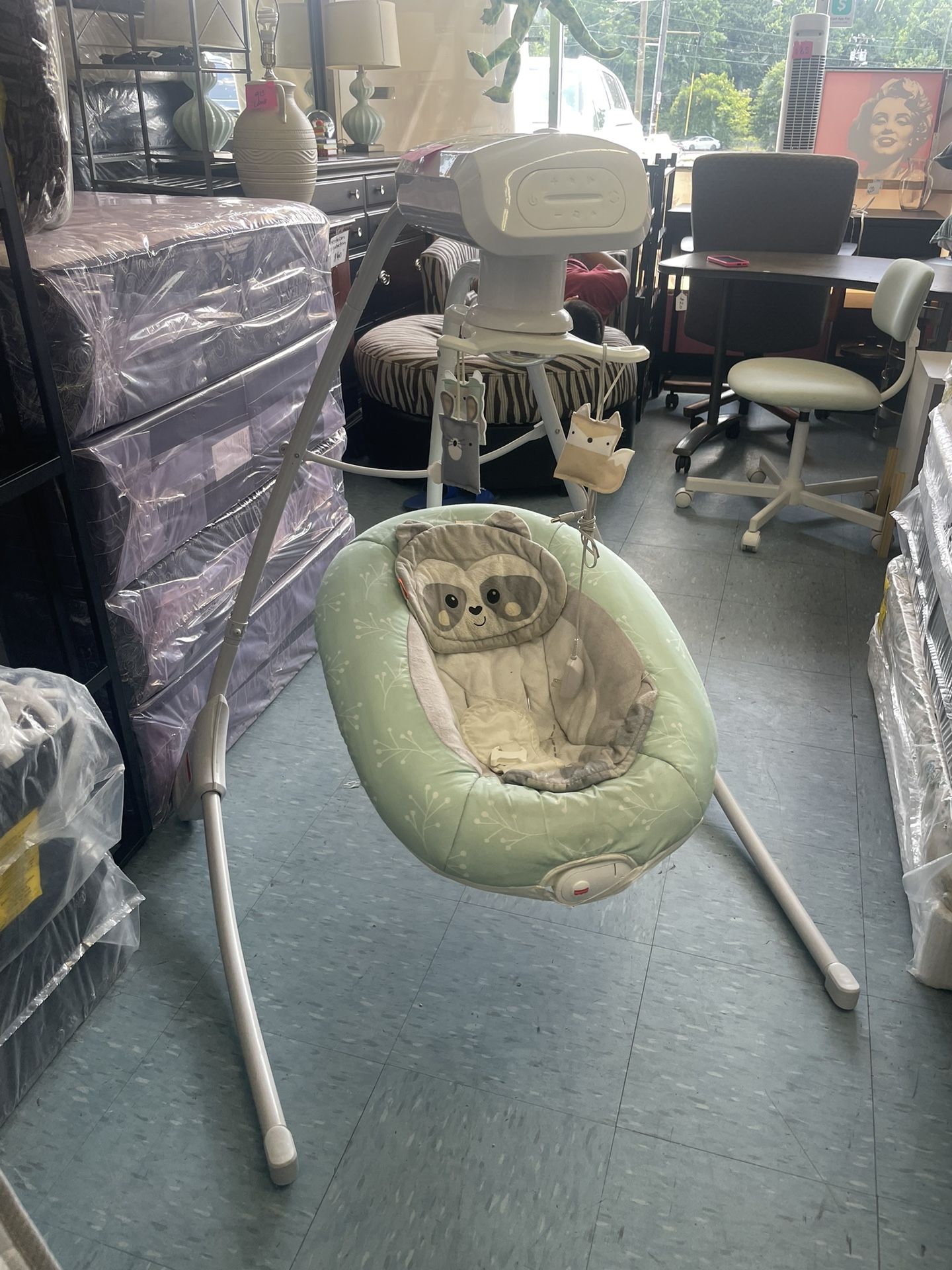 Fisher-Price Cradle 'n Swing, With relaxing music and multiple speeds,$30