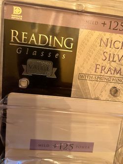Reading glasses. Mild plus 125+ power