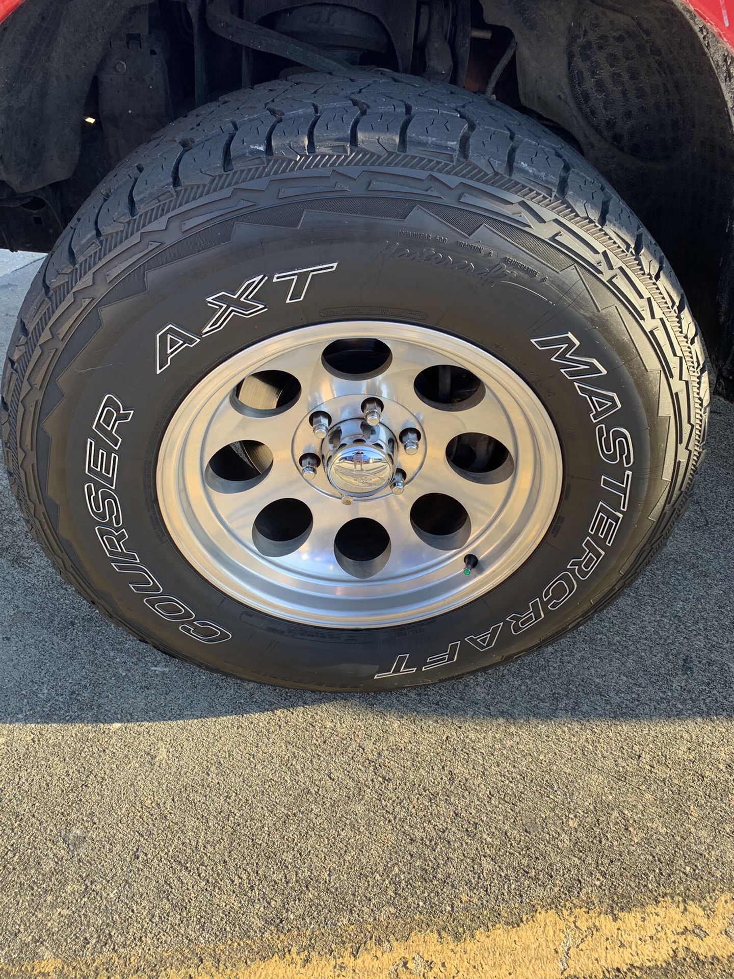 Photo 17 eagle alloy wheels wrapped in hardly worn 33 Master Craft tire. Tire tread is estimated 75Lug nuts included
