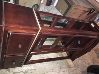 6 foot tall China cabinet. Needs glass. $100. Pick up only