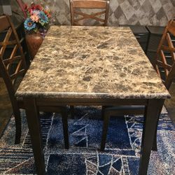dining room brown and cream table with chairs