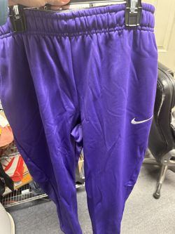 Nike purple track pants deals