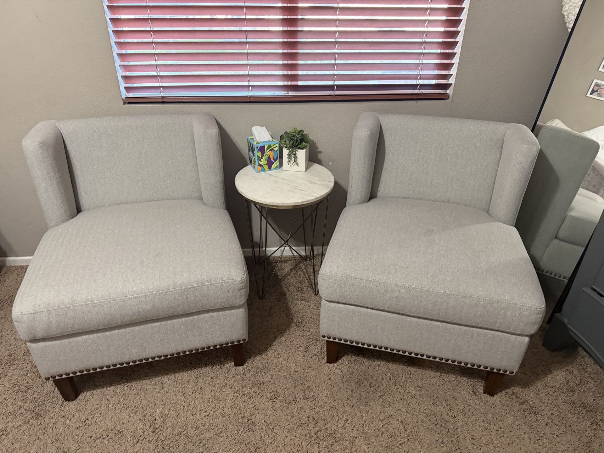 2 matching grey chairs