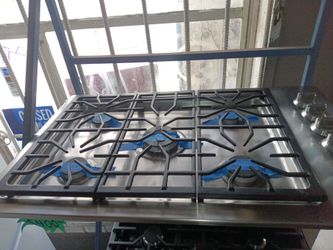Whirlpool stainless steel stove top 36 wide and repairs