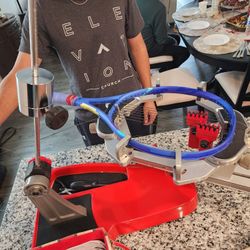 TENNIS RACKET STRINGING