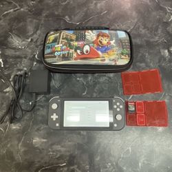 Nintendo Switch Lite with Splatoon 2 game, nintendo charger, carrying case