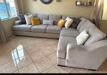 Beautiful Beige sectional couch from Jerome’s
