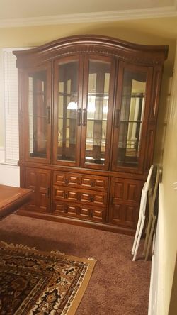 Very good looking China cabinet and dining table