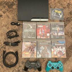 Sony Playstation 3 PS3 Slim 500 GB - Modded - With Over 42 Games pre installed + 7 Physical games  