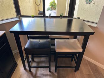 High top bistro table and 4 stools