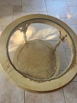 FREE table : 25” round - glass top  22” tall basket weave lower shelve
