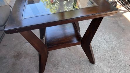 Beautiful wooden side table with a glass top