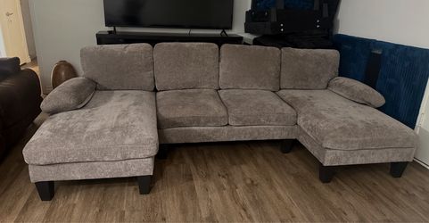 U-shaped sectional sofa, taupe, washable covers, excellent condition.