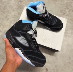 University blue/ black Jordan 5s