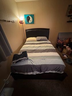 Wooden and leather bed frame
