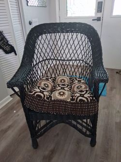 Black wicker chair with cushion furniture