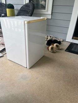 Mini fridge. Waist high. Works great. Smoke free home.