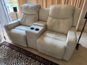 Dual Power recliners, power lumbar support, power head rest