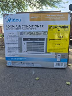 AC NEW IN BOX NEVER USED WILL DELIVER