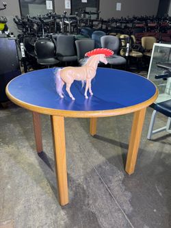 Blue Top Round Wood Table