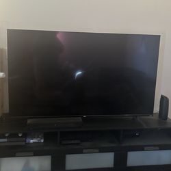 65 In Tv And Tv stand
