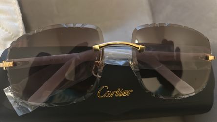 Cartiers Dark Glasses