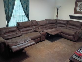 Large Couch Set. 2 electric recliners and 1 standard recliner.