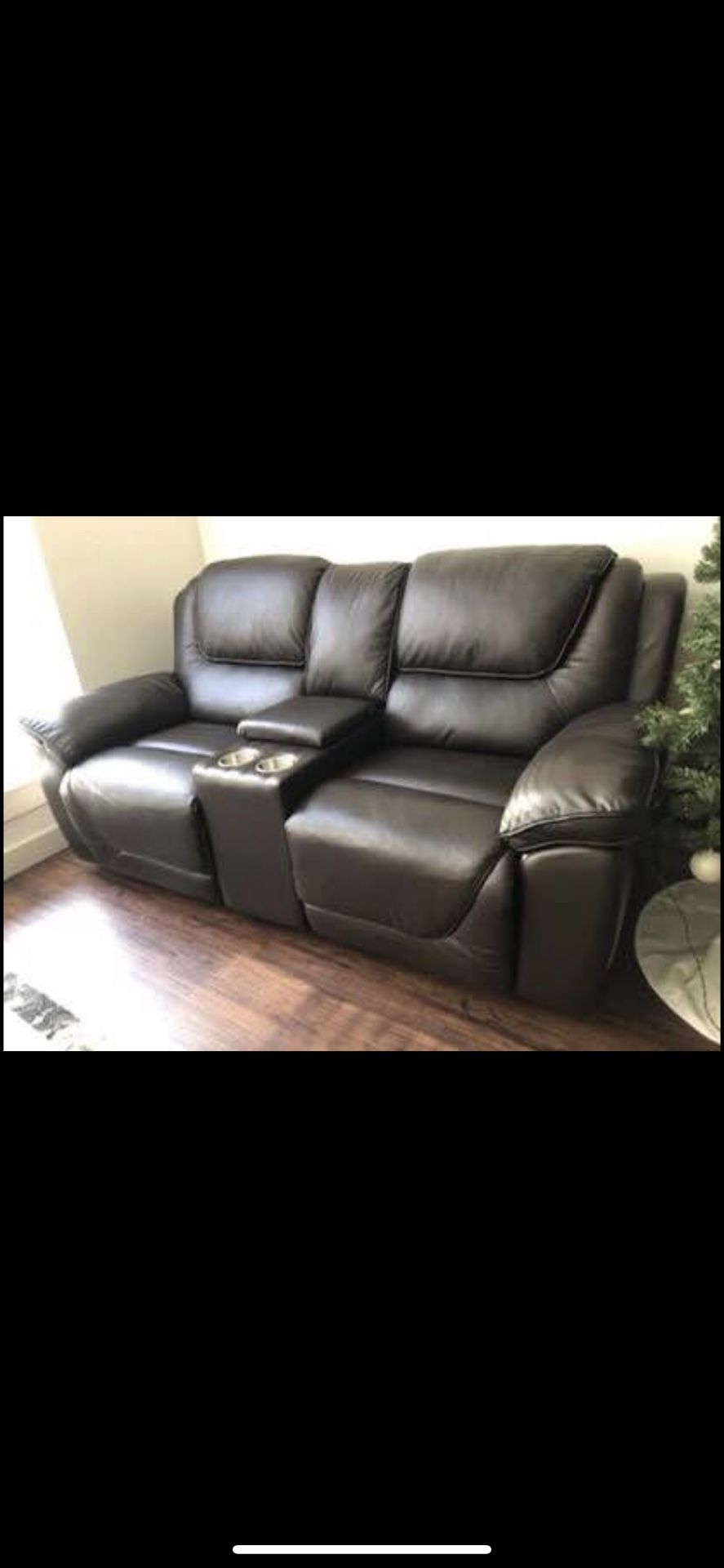 Leather automatic reclining loveseat