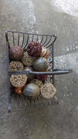 Large metal basket with decorative balls
