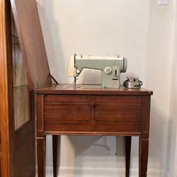 Antique Sewing Machine And Table 
