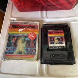 This is a vintage Imagic Riddle of the Sphinx game cartridge for the Atari 2600 console, released in 1982.  It is a single-player action and puzzle-so