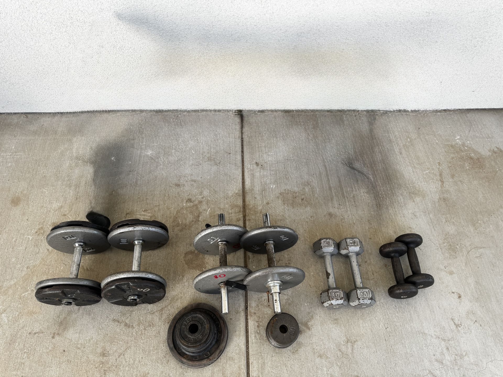 Various weights of dumbbells for strength training.