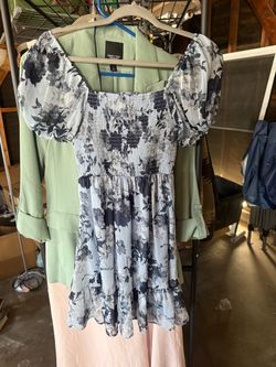 Simply Floral Smocked Mini Dress from Francesca’s