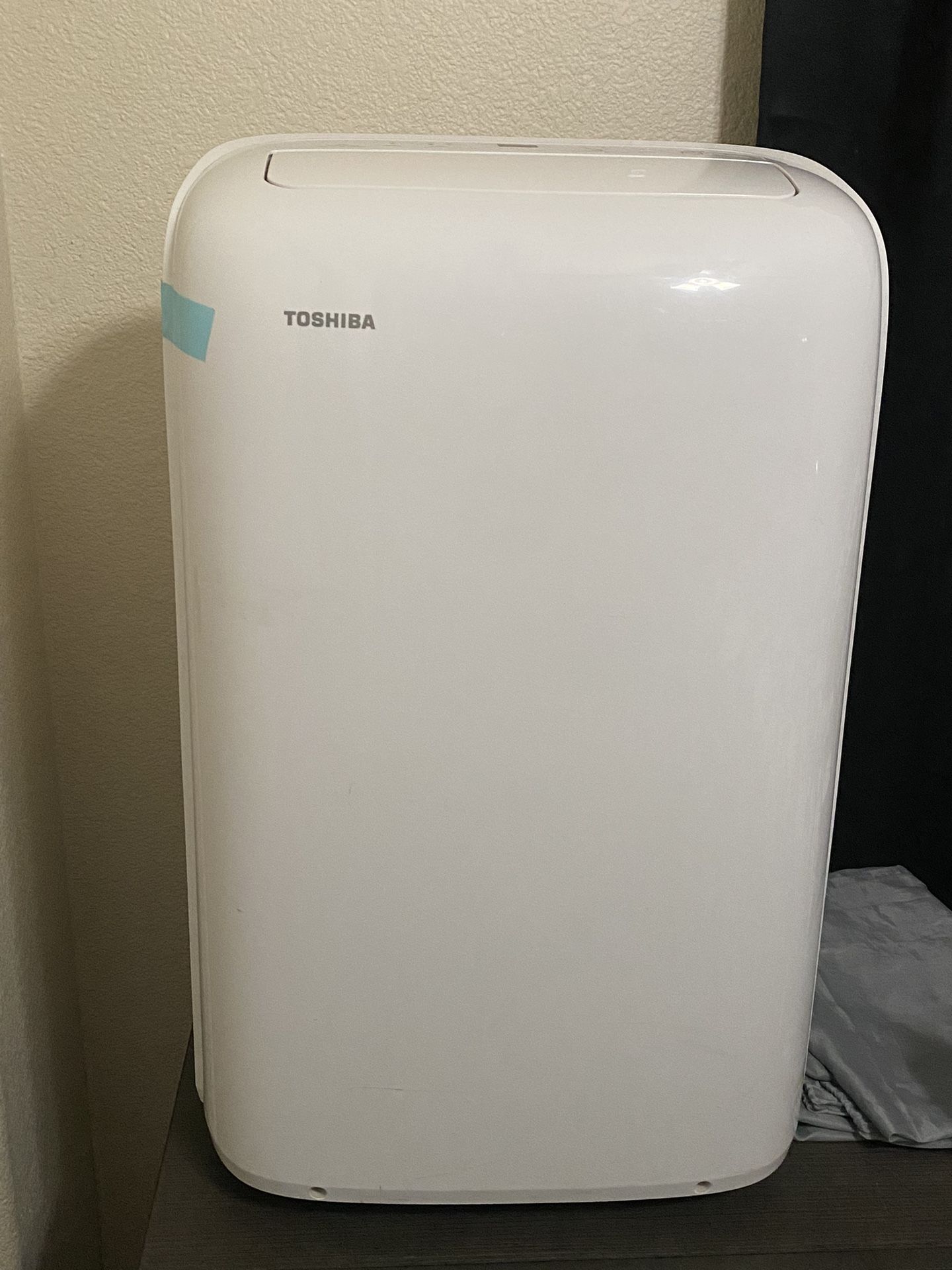 Toshiba 7,000 BTU Portable Air Conditioner Cools 300 Sq. Ft. with Dehumidifier and Remote in White