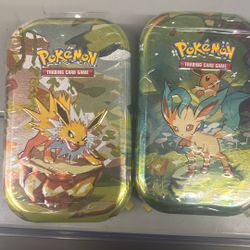 Pokémon Prismatic  Evolutions Tins 