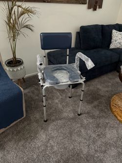 $40 FIRM brand new Drop Arm Shower BedsideCommode /  Toilet with Padded Seat