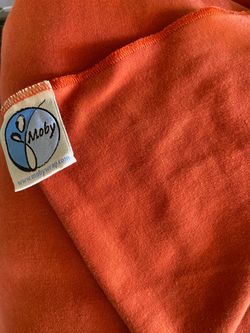 A MOBY Wrap baby carrier