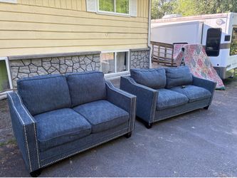 Two blue couches