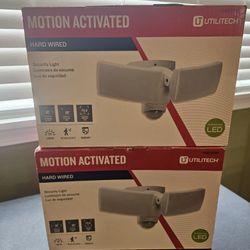 TWO Utilitech hard wired motion activated security lights - New in box