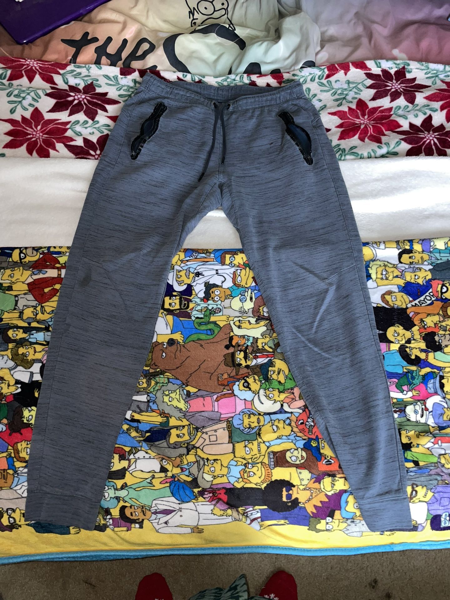 Blue sweatpants with small hole