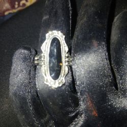 Silver ring with black onyx like stone