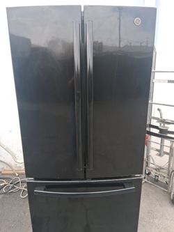 Black GE french doors apartment zide fridge fully functional