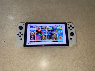 Nintendo Switch OLED with 7500 GAMES INSTALLED