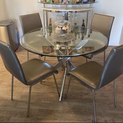 Glass Dining Table With 4 Grey Chairs 