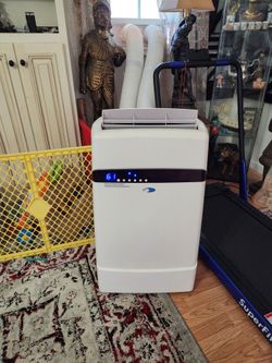 Like new portable ac with hose/ window kit/ blows ice cold air fast/ can test before buying