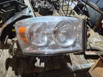 RAM Headlight 07-09 1500,2500,3500 Halogen passenger side