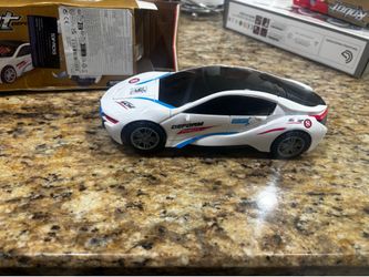 Interactive battery operated car that transforms while it’s driving around and bumped into things